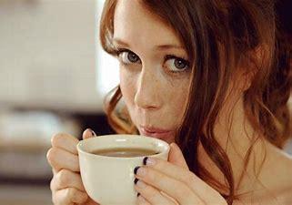 Woman sipping coffee